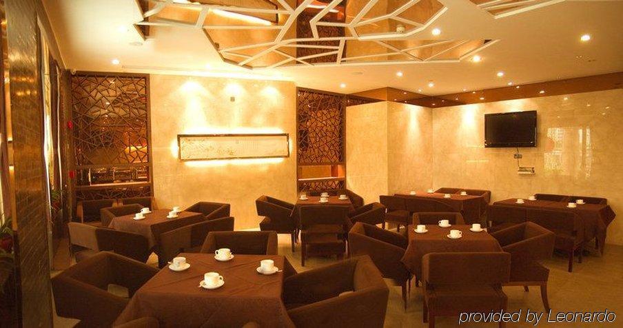 J-Hotel Guangzhou Restoran fotoğraf